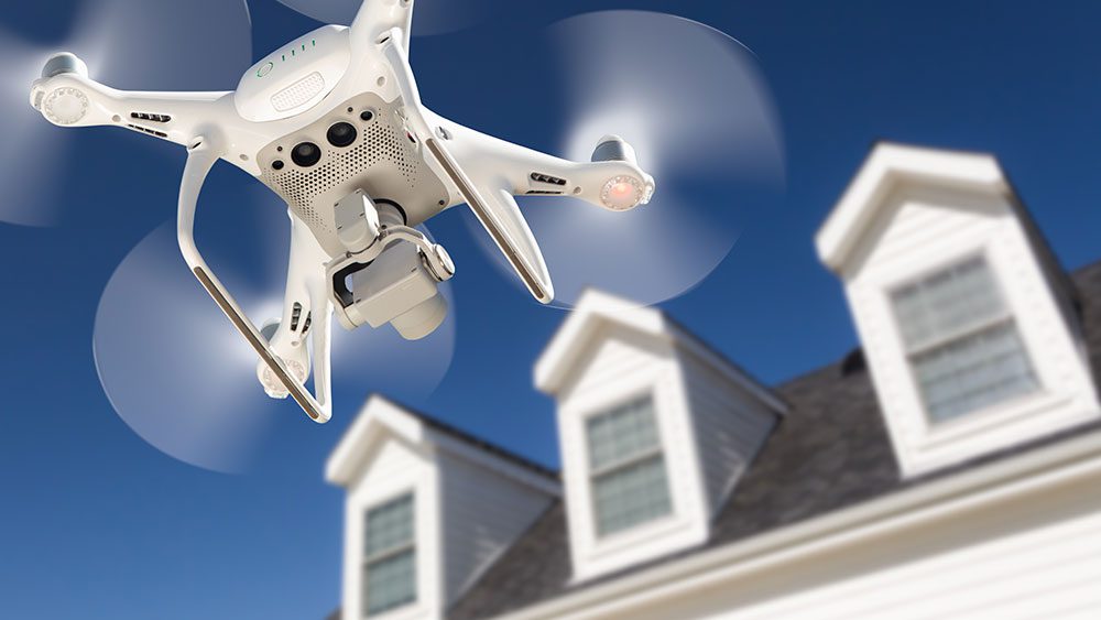 Drone taking pictures of a home for a real estate listing