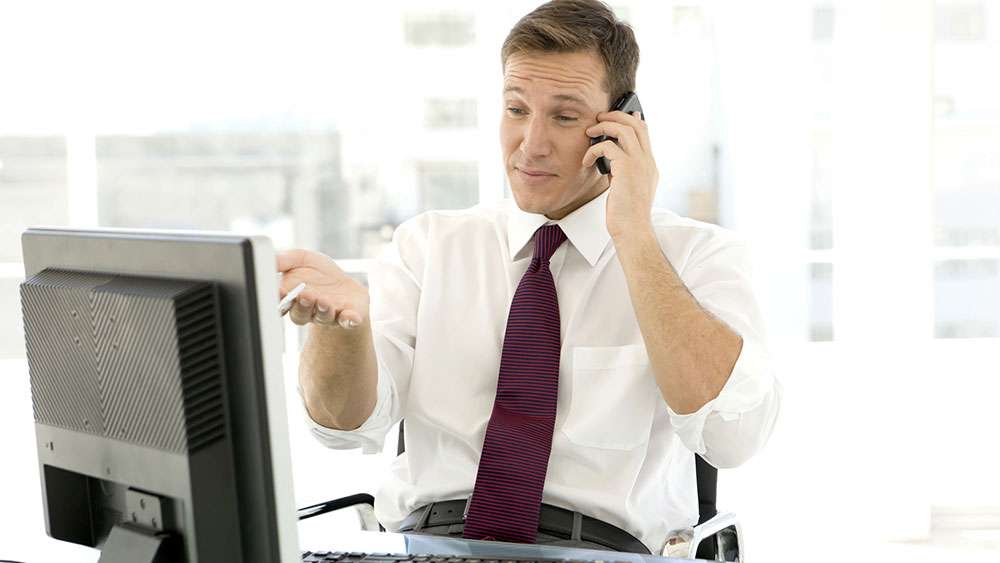 Busy real estate agent at work in the office