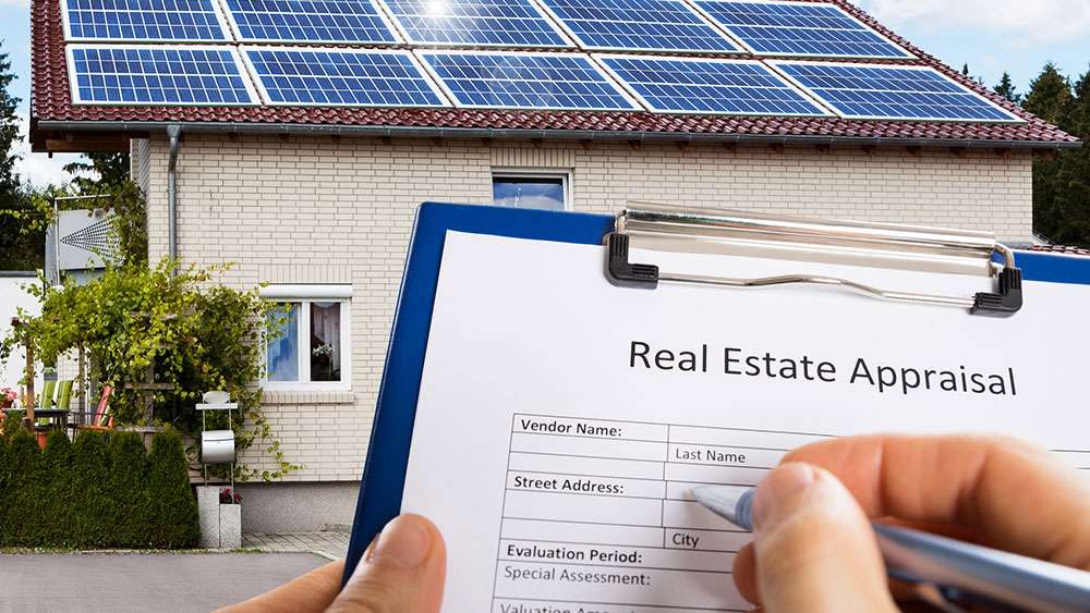 Real Estate appraiser filling out an appraisal form